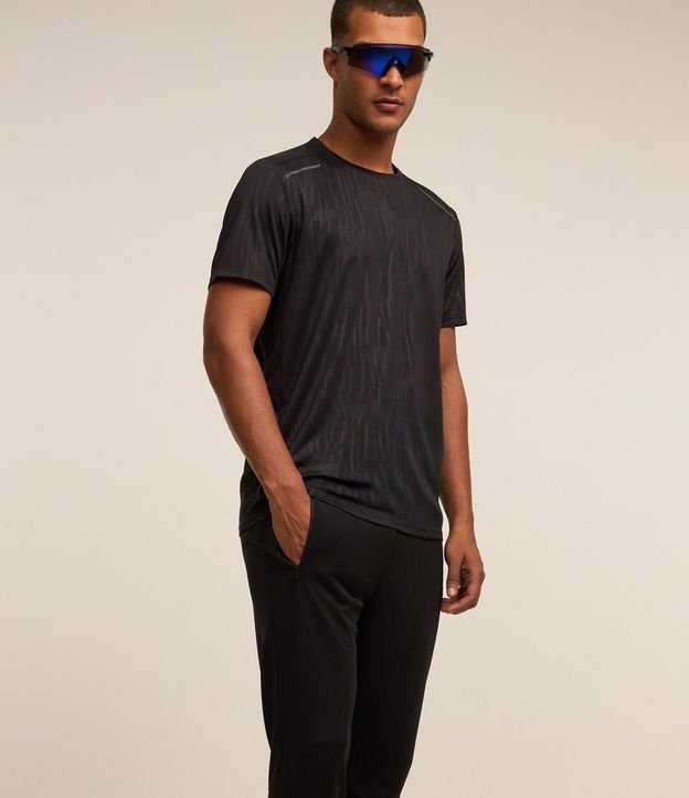 Pantalón Deportiva con Rayas Laterales y Cremallera en Bajo 4