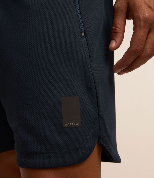 Bermuda Deportiva Texturizada con Cintura Elástica y Bolsillos con Cremallera 5