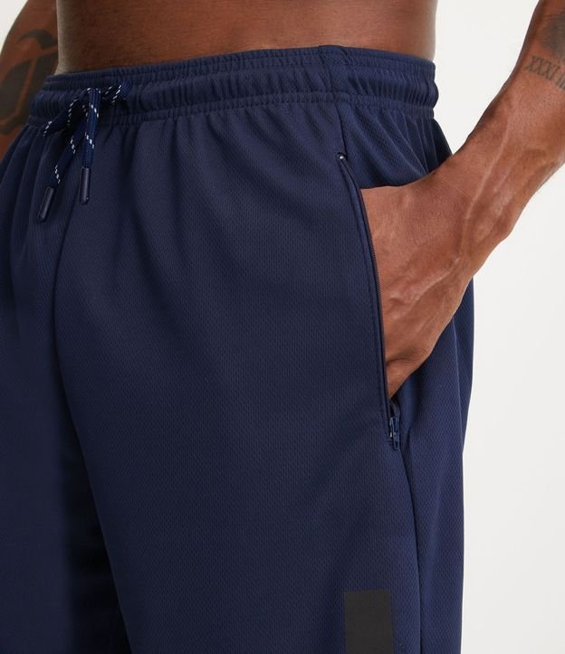Bermuda Deportiva Texturizada con Cintura Elástica y Bolsillos con Cremallera 4
