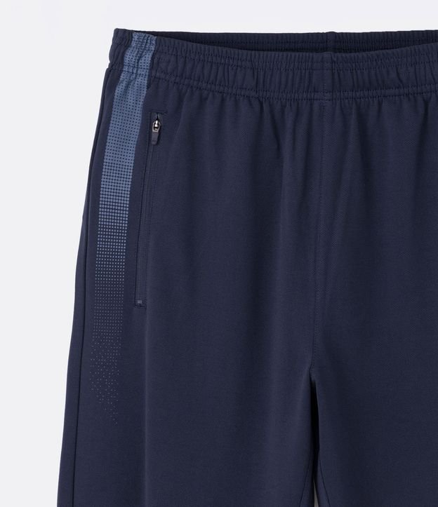 Pantalón Deportiva con Rayas Laterales y Cremallera en Bajo 7