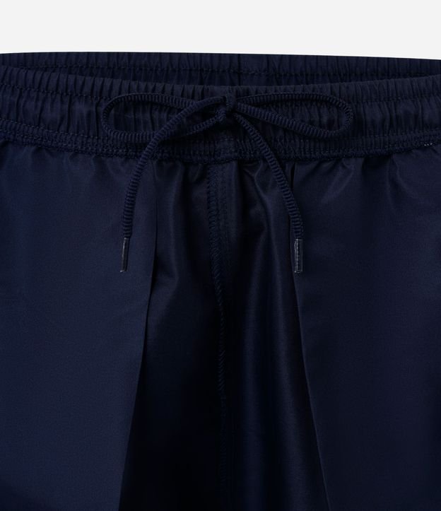 Bermuda Deportiva Básica con Cintura Elástica y Red Lateral 9