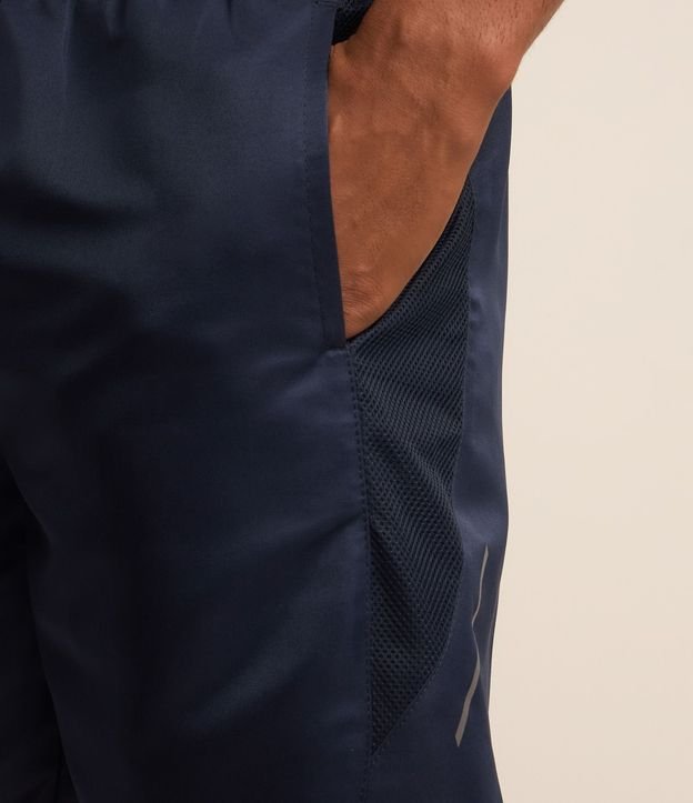 Bermuda Deportiva Básica con Cintura Elástica y Red Lateral 5
