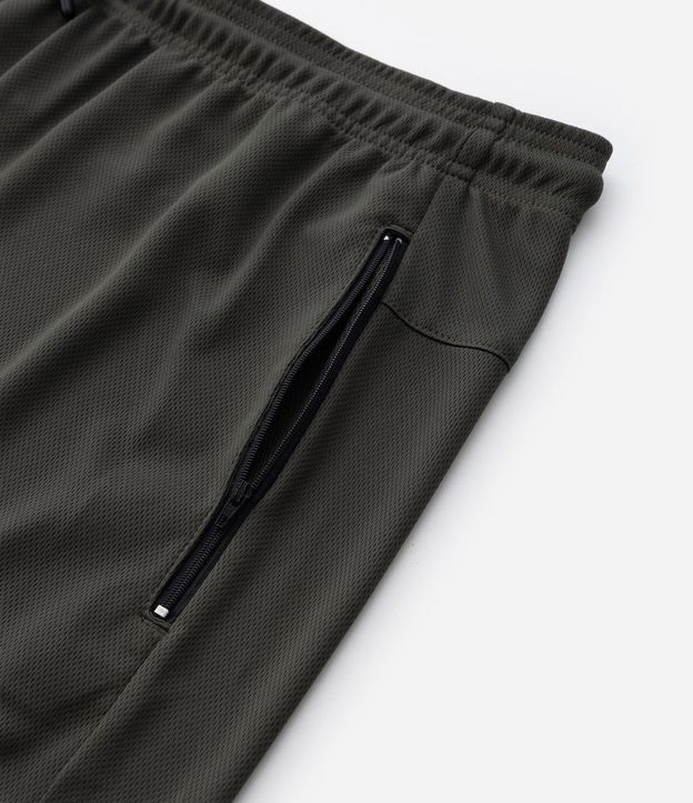 Bermuda Deportiva Texturizada con Cintura Elástica y Bolsillos con Cremallera 10