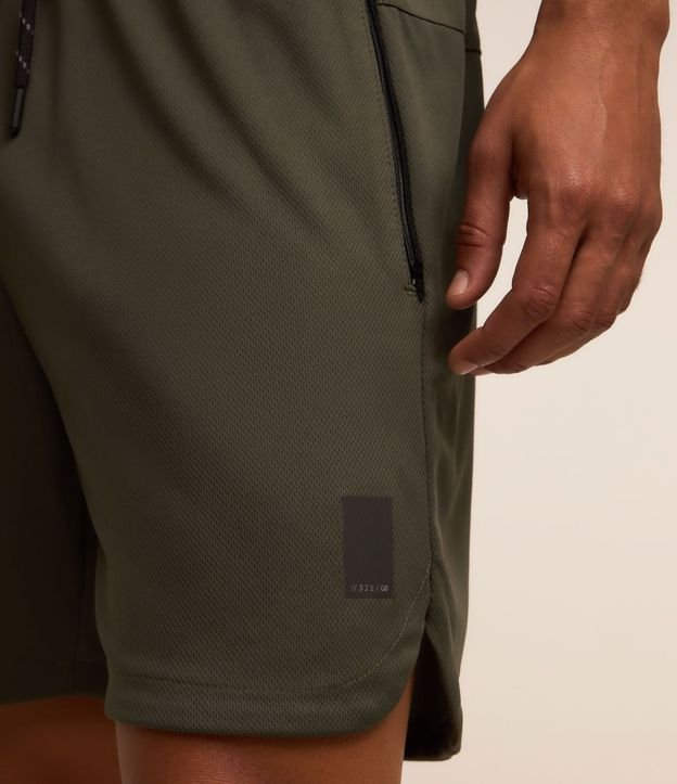 Bermuda Deportiva Texturizada con Cintura Elástica y Bolsillos con Cremallera 4