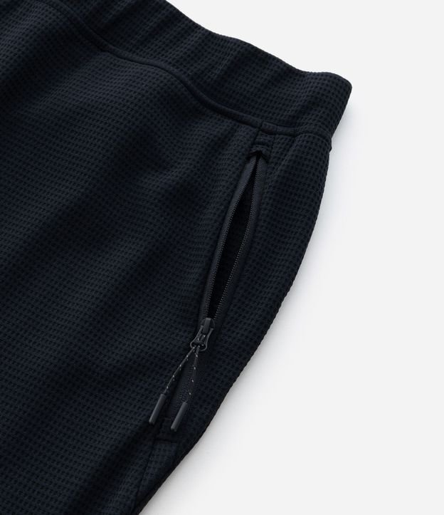Pantalón Deportivo en Tela Texturizada con Cierre en los Bolsillos 12