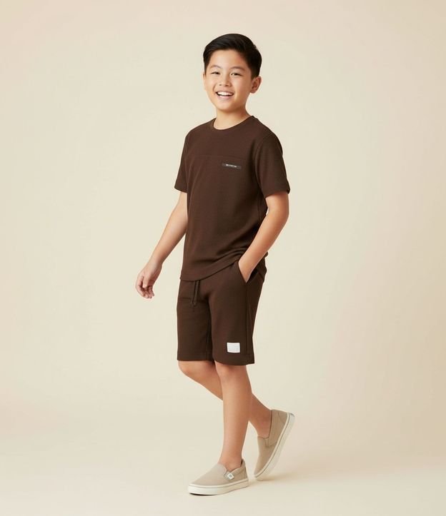 Remera Infantil Acanalada con Etiqueta Aplicada - Talle 5 a 14 años