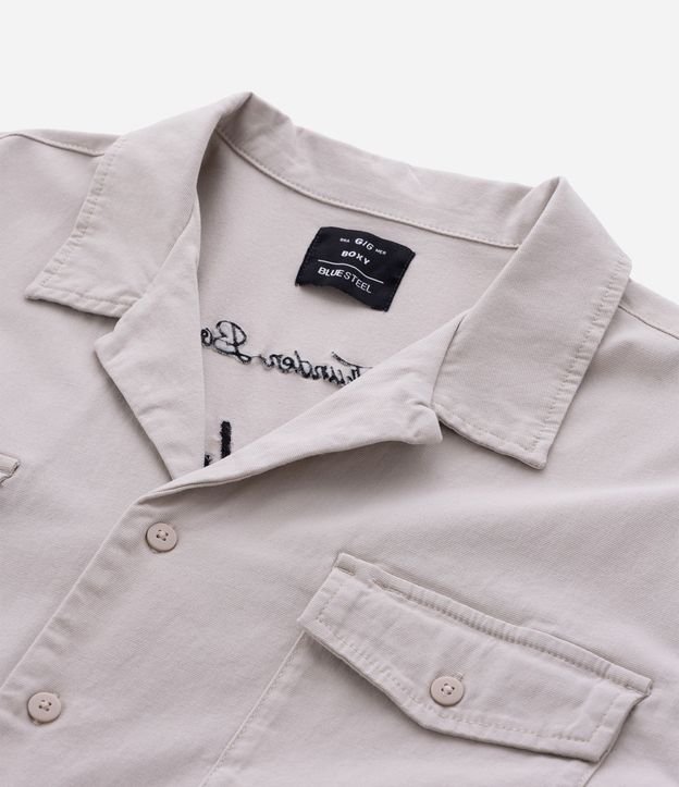 Camisa Boxy en Algodón Texturizado y Estampa Lettering Bordado 10