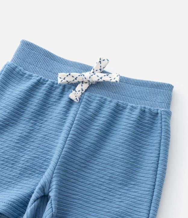 Conjunto Infantil con Elefante Interactivo y Bermuda con Cordón – Talle RN a 18 Meses 8