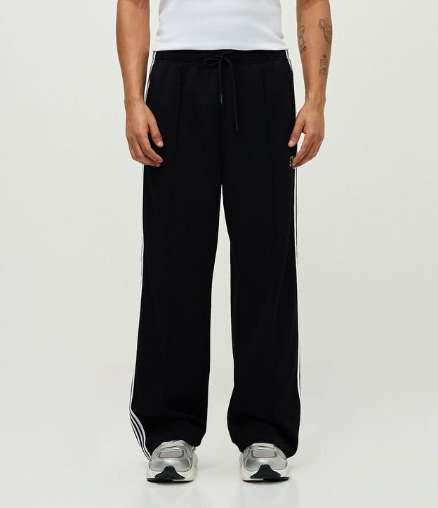 Pantalón Deportiva en Helanca con Rayas Laterales y Estampa Localizada 3