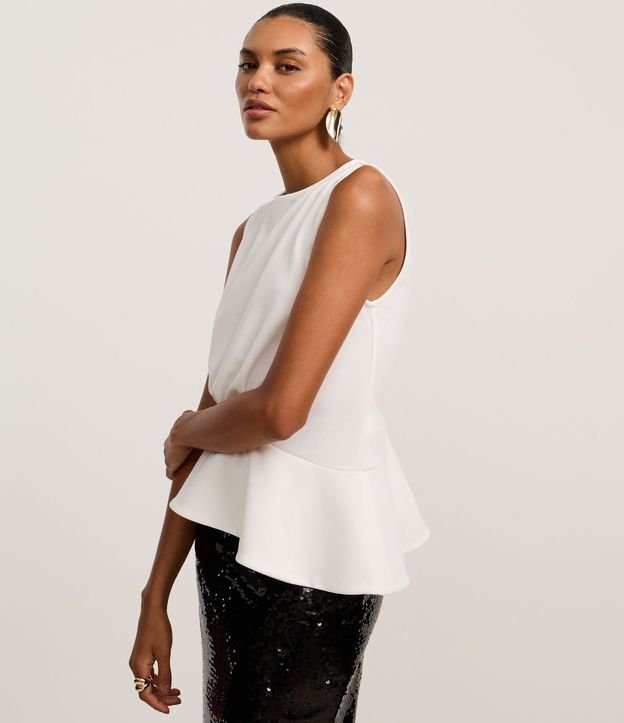 Blusa Peplum con Cuello Redondo y Ruedo Asimétrico 3