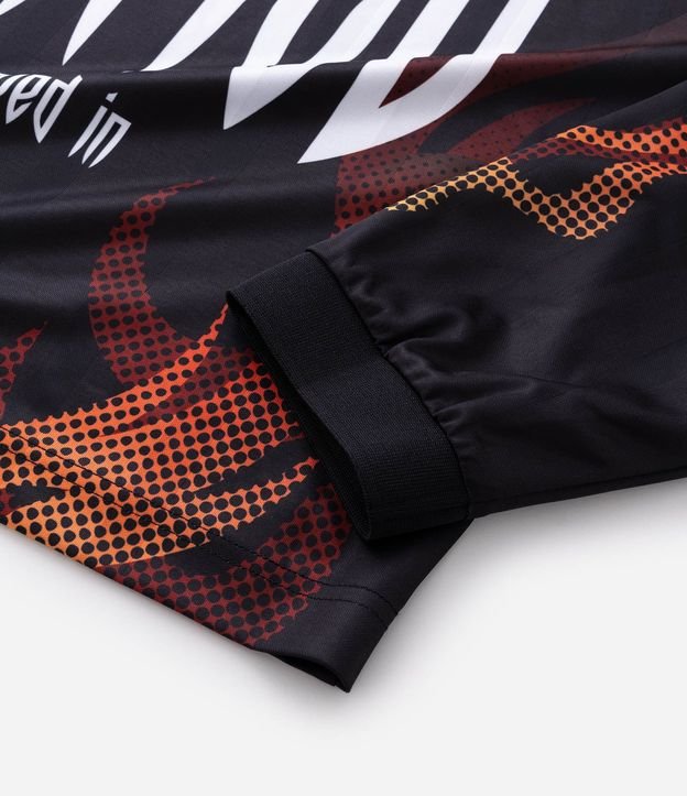Remera Boxy Manga Larga Estampado Chamas y Lettering Sinner 10