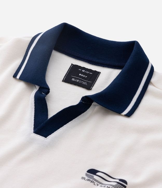 Remera Boxy Deportiva en Algodón con Cuello Polo Contrastante y Estampa Wonder 9