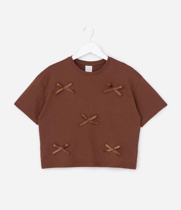 Remera Infantil Relaxed Boxy con Moñitas Aplicadas – Talle 5 A 14 años