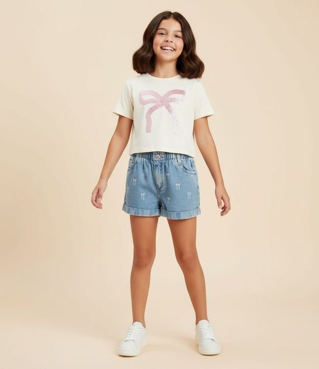 Short Infantil Clochard en Jeans con Estampado de Moñitas – Talle 5 a 14 años 1
