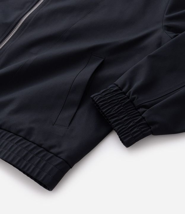 Campera Boxy con Elástico en el Ruedo y Recortes 12