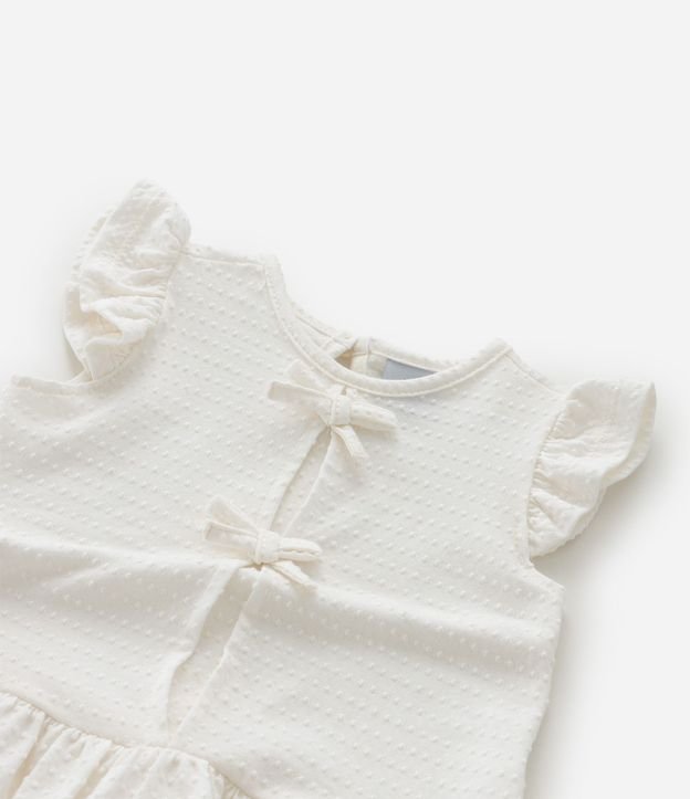 Blusa Infantil con Volados y Moñitas Aplicadas – Talle 0 a 18 Meses 9