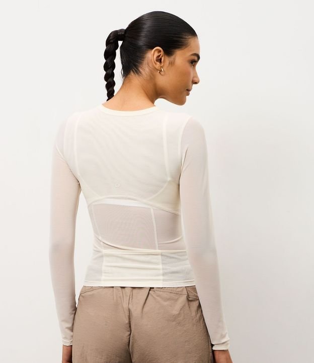 Remera Ajustada Deportiva en Microfibra con Bolsillo Funcional 4