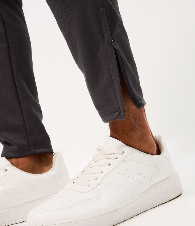 Pantalón Deportiva con Rayas Laterales y Cremallera en Bajo 3