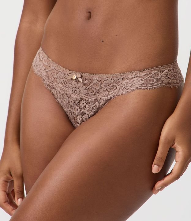 Bombacha Bikini Hilo en Encaje Floral con Moña en la Cintura 2