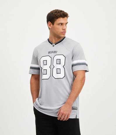 Remera Deportiva Dry Fit Futbol Americano con Estampado Miami 88 Renner
