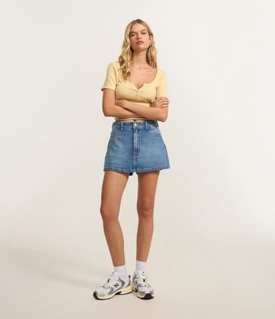 Short Pollera en Jeans Tiro Alto con Bolsillos Deshilachados