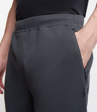 Pantalón Deportivo en Tela Texturizada con Cierre en los Bolsillos 4