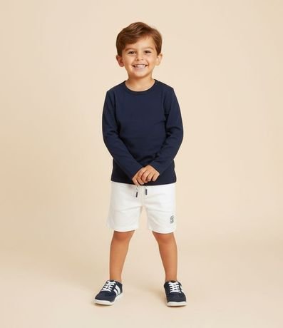 Remera Básica Infantil en Suedine con Etiqueta en loj Bajo - Talle 1 al 5 años