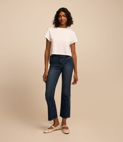 Pantalón Flare Jeans y Bajo con Corte a Hilo