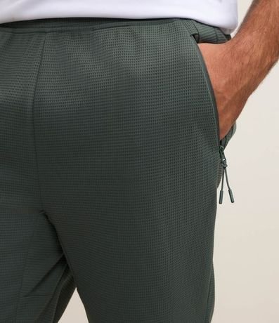 Pantalón Deportivo en Tela Texturizada con Cierre en los Bolsillos 4
