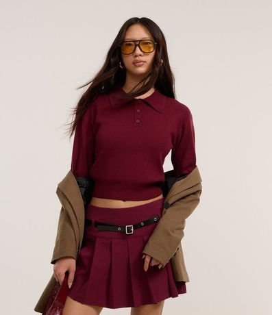 Suéter en Punto con Cuello Polo y Botones en la Vista