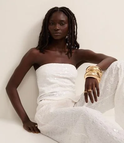 Top sin breteles en Lentejuela con Colissê Lateral y bajo Assimétrica