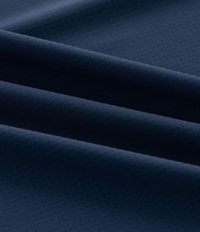 Remera Deportiva Texturizada con Detalle Reflectante 4