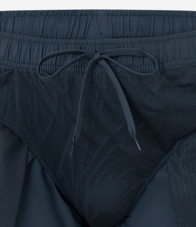 Bermuda Tecnológica con Estampa Reflectiva Lateral 6