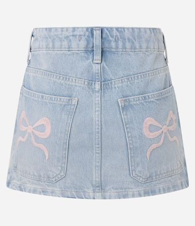 Pollera Mini en Jeans con Bolsillo Cuchillo y Bordado de Lazo 5