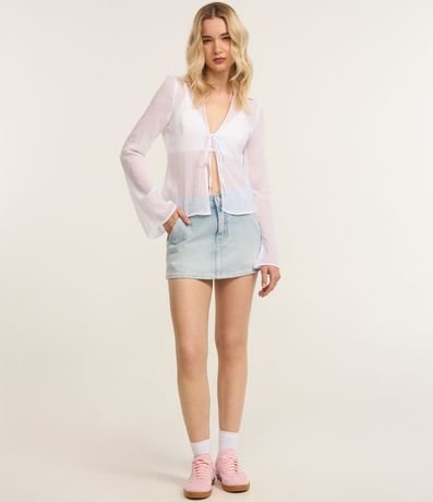 Pollera Mini en Jeans con Bolsillo Cuchillo y Bordado de Lazo 2