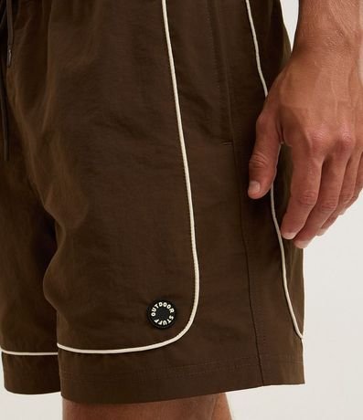 Bermuda Tecnológico Liso con Piping Contrastante 5