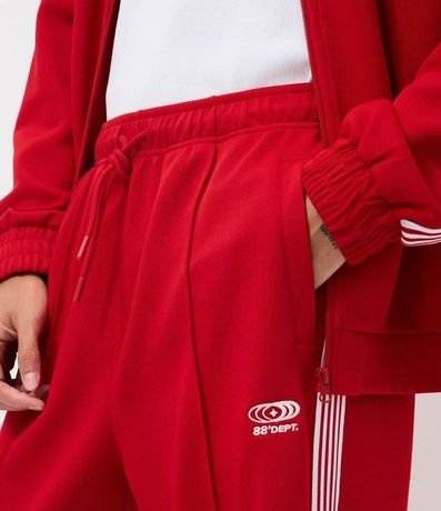 Pantalón Deportiva en Helanca con Rayas Laterales y Estampa Localizada 4