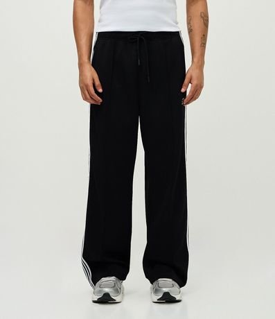 Pantalón Deportiva en Helanca con Rayas Laterales y Estampa Localizada 3
