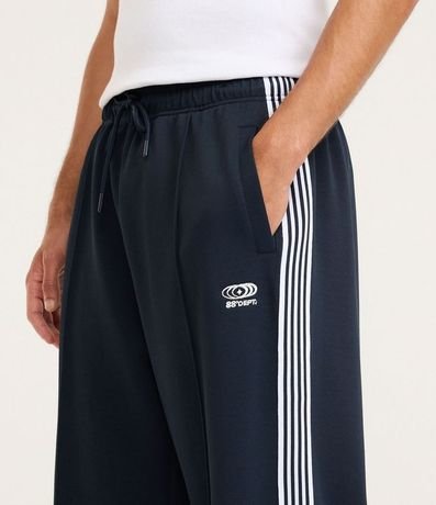 Pantalón Deportiva en Helanca con Rayas Laterales y Estampa Localizada 4