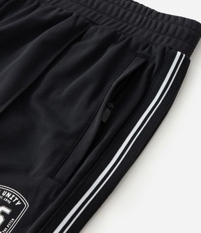 Pantalón Deportiva en Helanca con Rayas Laterales 8