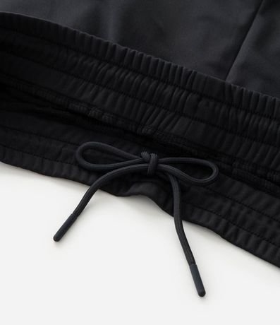 Pantalón Deportiva en Helanca con Rayas Laterales 9