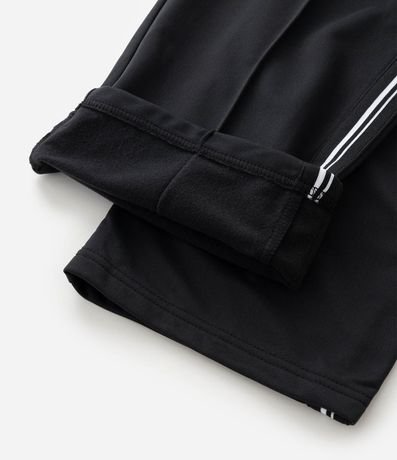 Pantalón Deportiva en Helanca con Rayas Laterales 10