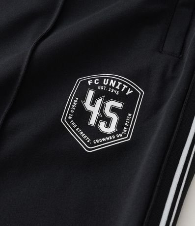 Pantalón Deportiva en Helanca con Rayas Laterales 11