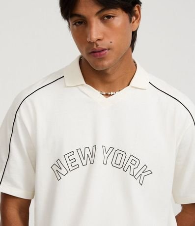 Remera Boxy en Algodón Texturizado con Rayas y Estampa New York 3
