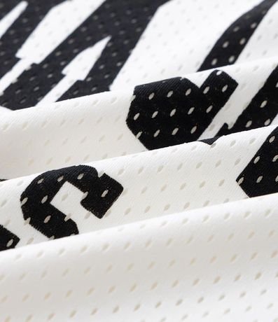 Remera Boxy en Mesh con Estampa Lettering New York City Athletics 8