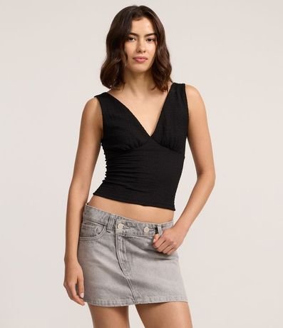 Mini pollera en Jeans con Cintura Traspasada y Bolsillos 2