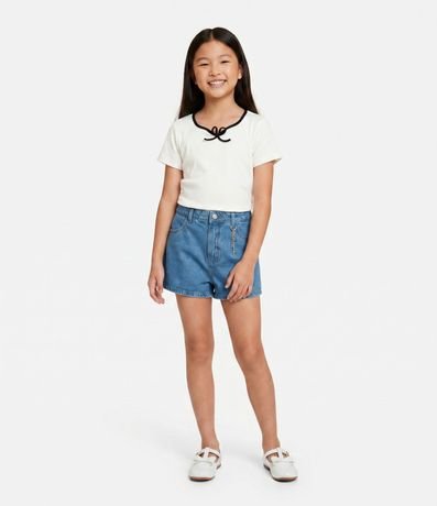 Short Pollera Infantil en Jeans con Colgantes Metálicos – Talle 7 a 16 años