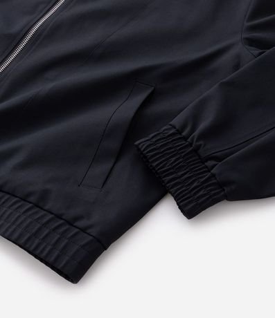 Campera Boxy con Elástico en el Ruedo y Recortes 10