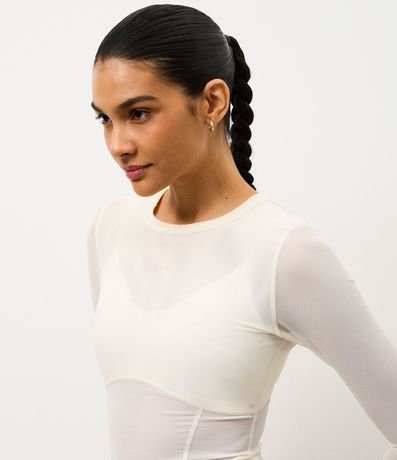 Remera Ajustada Deportiva en Microfibra con Bolsillo Funcional 5